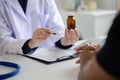 Doctor are recommending medicines to patients after being examined and diagnosed by the patient's doctor Royalty Free Stock Photo