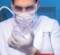 Doctor researching new virus in lab at night Royalty Free Stock Photo