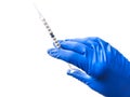 Doctor`s hand in blue medical glove holding open syringe with medical solution isolated white background. Flu vaccine Royalty Free Stock Photo