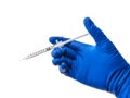 Doctor`s hand in blue medical glove holding open syringe with medical solution isolated white background. Flu vaccine Royalty Free Stock Photo