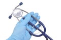 Doctor`s hand in blue medicine glove with stethoscope isolated white background Royalty Free Stock Photo