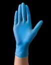 Doctor`s hand in sterile medical gloves showing palm in warning sign isolated Royalty Free Stock Photo