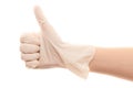 Doctor's hand in white surgical glove showing thumbs up sign Royalty Free Stock Photo