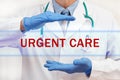 Doctor`s hands with URGENT CARE inscription Royalty Free Stock Photo