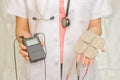 Doctor's hold Medical Tens Unit