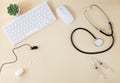 Doctor`s online consultation and remote medical communication concept. Keyboard, stethoscope, microphone Royalty Free Stock Photo