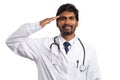 Doctor saluting with hand on forehead