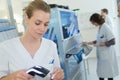 Doctor scanning data from blood bags