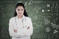 Doctor with scribble on the blackboard Royalty Free Stock Photo