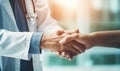 Doctor Shaking Hands With a Patient