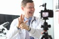 Doctor shoots video blog, explains sign language