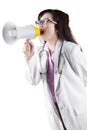 Doctor shouting on megaphone Royalty Free Stock Photo