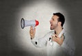 Doctor shouting whit a megaphone Royalty Free Stock Photo