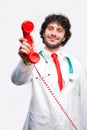 Doctor showing a classic telephone reciver