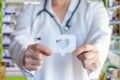 The doctor is showing a cloud with a heart Royalty Free Stock Photo