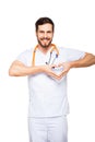 Doctor showing heart sign