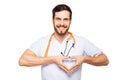 Doctor showing heart sign