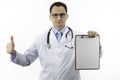 Doctor showing like sign holding blank clipboard. Approved by doctors concept