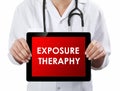 Doctor showing tablet with EXPOSURE THERAPHY text.
