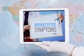 Doctor showing tablet PC with monkeypox symptoms screen Royalty Free Stock Photo