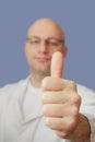 Doctor showing thumbs up. Royalty Free Stock Photo