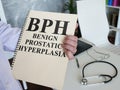 Doctor shows Benign prostatic hyperplasia BPH diagnosis.