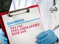 A Doctor shows diagnosis pelvic inflammatory disease. Royalty Free Stock Photo