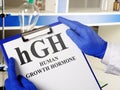 Doctor shows hGH Human growth hormone sign