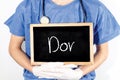 Doctor shows information on blackboard: pain in portuguese. Medical concept