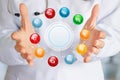 Doctor shows vitamins in his hands Royalty Free Stock Photo