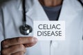 Doctor and signboard with text celiac disease