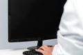 Doctor sitting on the computer, monitor with copyspace, concept telemedicine and telehealth Royalty Free Stock Photo