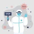 Doctor in special protective uniform. Medical worker holding board with text -stop. Big virus covid-19