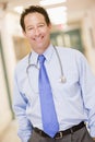Doctor Standing In A Hospital Corridor Royalty Free Stock Photo