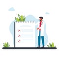 doctor stands near a large sheet of tasks. man, manager prioritizing tasks in to do list. Royalty Free Stock Photo