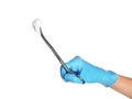 Doctor in sterile glove holding medical clamp with cotton ball