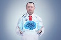 Doctor with stethoscope and brains. gray background. High resolution. Royalty Free Stock Photo