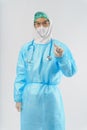 Doctor PPE uniform holding coronavirus covid-19 vaccine bottle on hand Royalty Free Stock Photo