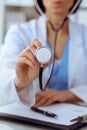 Doctor with a stethoscope in the hands, close up. Physician ready to examine and help patient. Medicine, healthcare and Royalty Free Stock Photo