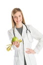 Doctor With Stethoscope Showing Green Apple And Tape Measure Royalty Free Stock Photo