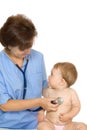 Doctor with stethoscope and small smiling baby #6 Royalty Free Stock Photo