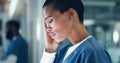 Doctor, stress and black woman with headache, anxiety or neck pain while working in a hospital at night. Healthcare Royalty Free Stock Photo