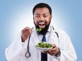Doctor studio portrait, black man and salad to lose weight, vegan healthcare diet or healthy food benefits for clean Royalty Free Stock Photo
