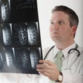 Doctor studying mri Royalty Free Stock Photo