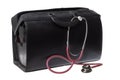 Doctor suitcase hand bag, made of black leather. For medical instruments with stethoscope. Isolated on white background Royalty Free Stock Photo