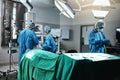 Doctor, surgeon and employees in hospital, theater and emergency room busy in medical career. People, healthcare workers Royalty Free Stock Photo