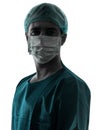 Doctor surgeon man portrait with face mask silhouette Royalty Free Stock Photo