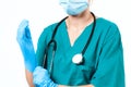 Doctor surgeon in sterile mask is wearing gloves before surgery Royalty Free Stock Photo