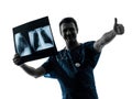 Doctor surgeon radiologist examining x-ray image Royalty Free Stock Photo