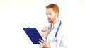 Doctor, surgeon reading medical reports , white background Royalty Free Stock Photo